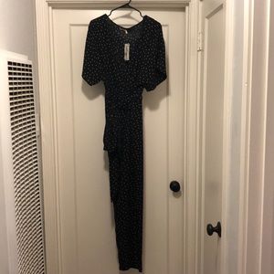 Polka dot black jumpsuit/ romper